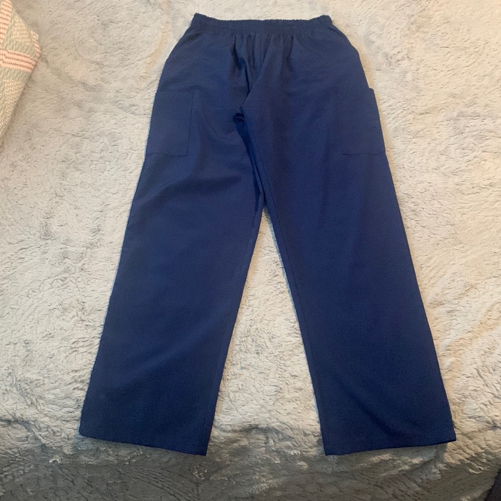 Mint condition women blue, scrub pants, size medium.